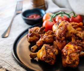 Ketchup and crispy roasted chicken legs Stock Photo 02