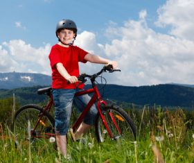 Little boy riding bicycle Stock Photo