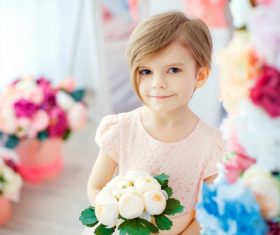 Little girl holding white bouquet Stock Photo 01