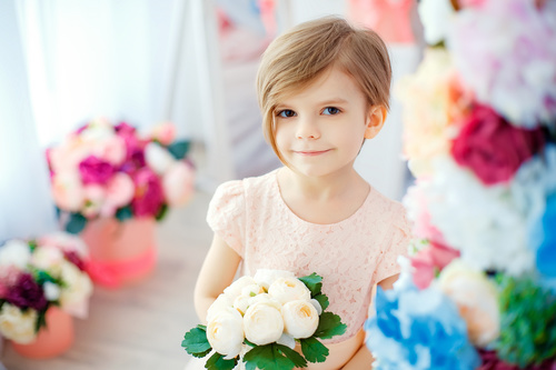 Little girl holding white bouquet Stock Photo 01