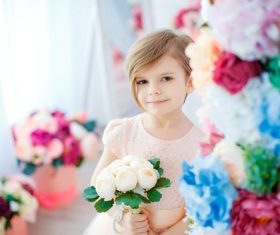 Little girl holding white bouquet Stock Photo 02