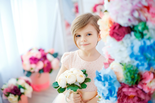 Little girl holding white bouquet Stock Photo 02
