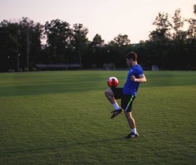 Man Jolts the ball Stock Photo