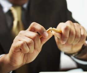 Man break off pencil Stock Photo