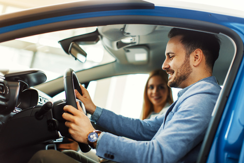 Man buying a new car test drive Stock Photo