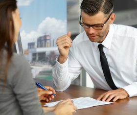 Man looking at contract Stock Photo