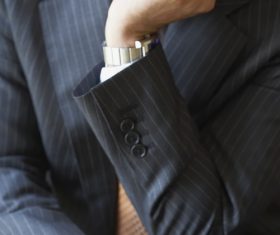 Man looking at the keyboard in a daze Stock Photo