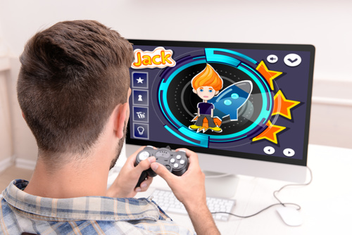 Man uses game handle to play games Stock Photo 03