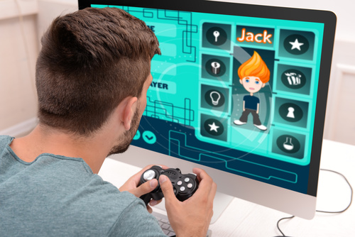 Man uses game handle to play games Stock Photo 04
