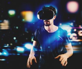 Man wearing VR virtual glasses Stock Photo