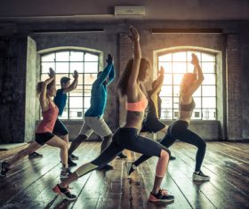 Men and women doing aerobics Stock Photo