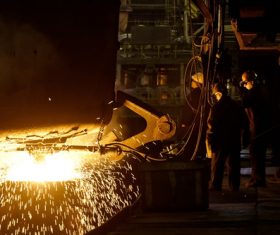 Metallurgy furnace and smelter metal factory workers Stock Photo