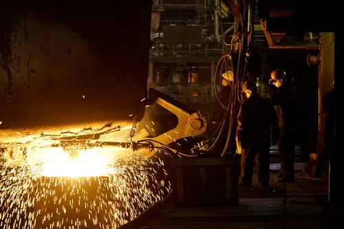 Metallurgy furnace and smelter metal factory workers Stock Photo