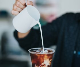 Mixing ice milk coffee beverage Stock Photo