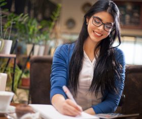 Modern businesswoman working at cafe Stock Photo 01