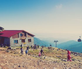 Mountaineering tourists and sightseeing cable car Stock Photo