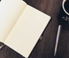 Notebook on the desktop Stock Photo