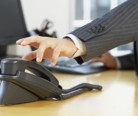 Office to answer the phone Stock Photo