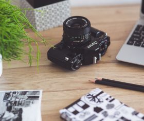 Old Canon on the wooden desk Stock Photo