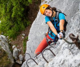 Outdoor climbing woman smiling Stock Photo
