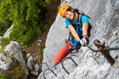Outdoor climbing woman smiling Stock Photo