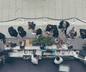 People gathering on outdoor buffet Stock Photo