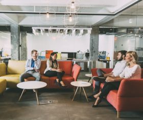 People talking in the lounge area Stock Photo