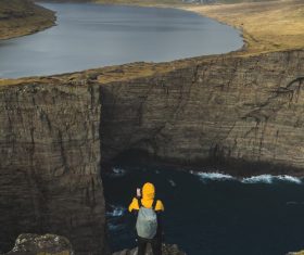 Person enjoying awesome mountain river scenery Stock Photo