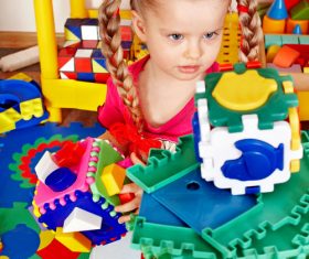 Playing with building block little girl Stock Photo