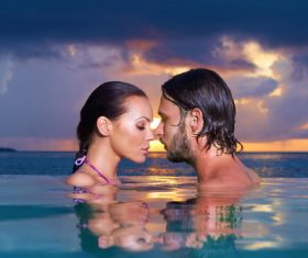 Romantic moments in the pool Stock Photo