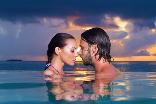 Romantic moments in the pool Stock Photo
