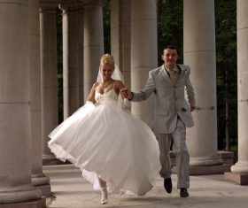 Running newlyweds Stock Photo