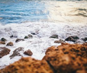 Seawater scouring the coast Stock Photo