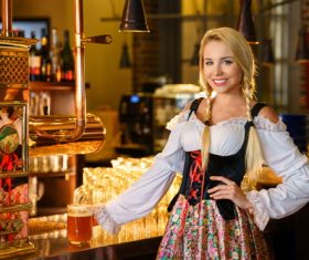 Smiling bar waitress Stock Photo