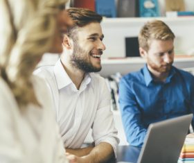 Smiling man at the meeting Stock Photo