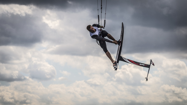 Sporty man extreme with sky sliding sports Stock Photo
