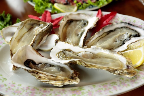 Steamed oysters and lemon Stock Photo 01
