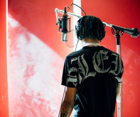 Stylish young man in stereo studio Stock Photo