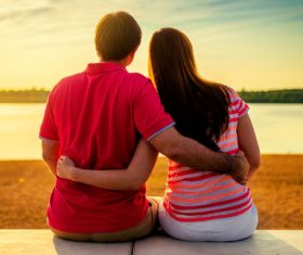 Sweet couple enjoying the sunset Stock Photo 04