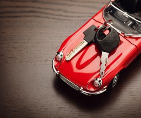 Toy car and car keys on the desktop Stock Photo 01
