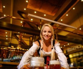 Waitress holding two glasses of beer Stock Photo 03