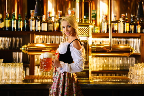 Waitress holding two glasses of beer Stock Photo 04