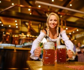Waitress holding two glasses of beer Stock Photo 06