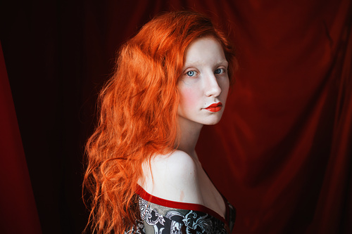 White skin redhead girl Stock Photo