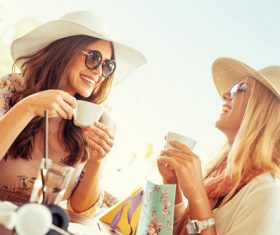 Woman chatting in cafe after shopping Stock Photo 02
