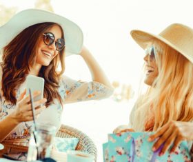 Woman chatting in cafe after shopping Stock Photo 03