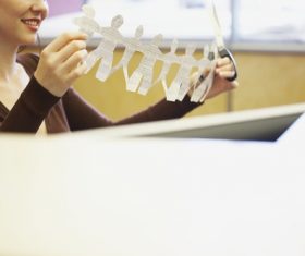 Woman cutting paper Stock Photo