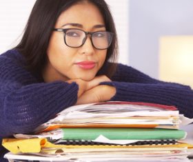 Woman lying listlessly on the folder Stock Photo