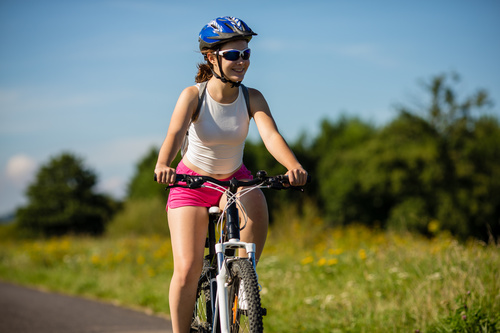 Woman riding bicycle exercise Stock Photo