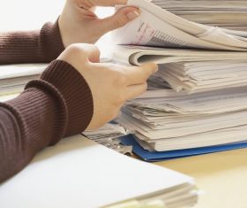 Woman scrolls through data Stock Photo 01